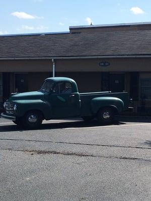 I'll cars parked outside Wonderful bartender