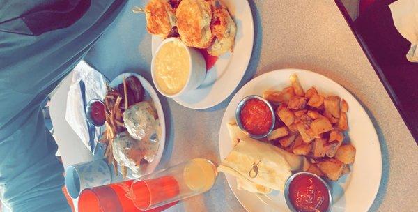 Biscuits & Gravy, breakfast burrito, honey blueberry chicken biscuits.