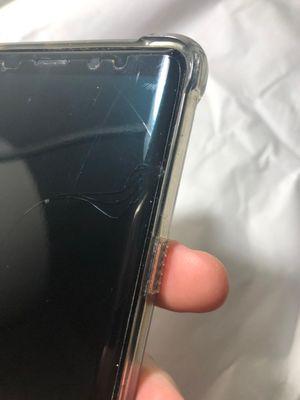 Original damage prior to repair, but very similar to what the phone looks like presently 2/26, just lower down on the same side.