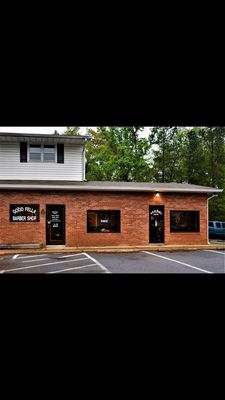 Front side of the Goodfellas Barbershop next to the post office.