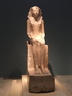 Female Pharaoh Hatshepsut of Egypt wearing men's nemes headpiece reserved for "male" Pharaohs.