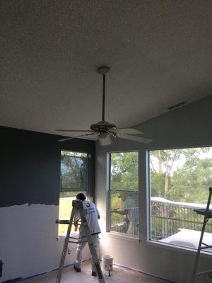 Ceiling fan installation.