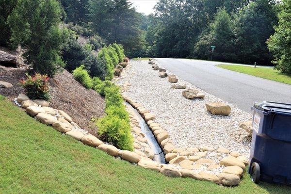 River Rock and flats finish off this yard work.