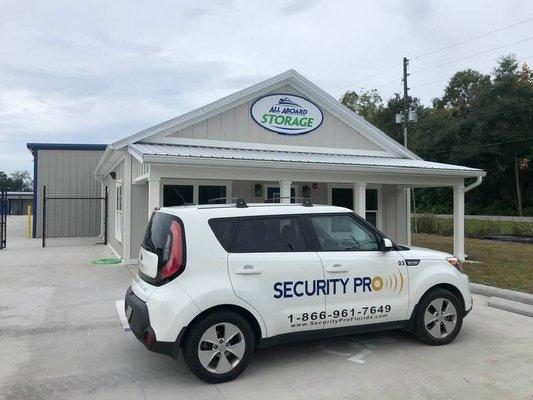 Security Pro of Florida LLC installing a video surveillance system at a storage facility.