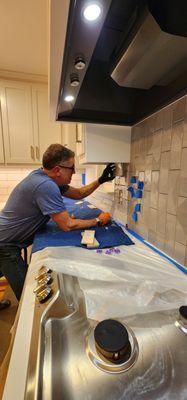 Dan is very articulate at kitchen back splash and accent tiles above thee stove.