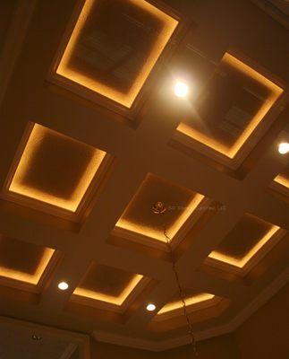 Installed led string lights to a coffer ceiling to create a glowing effect. Also added 4 recessed lights.