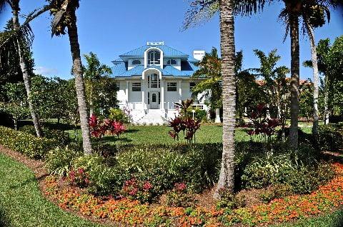 beautiful deep water home east end sanibel island. Pool- spa- dock- lift- interior hard wood floors, f/p many new features.