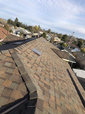 Composition shingle install - All in the details; our shingles are in straight lines in waves.