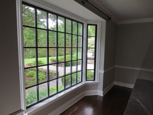 Completed dining room painting. Client got creative and choose to paint the window sashes black. Greenwich, CT.