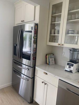 Cabinets, countertop and tiles