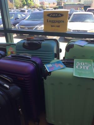 "Luggages" on sale. Come get your "luggages"