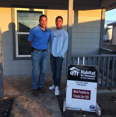 With my son, volunteering for the Habitat for Humanity of San Antonio.