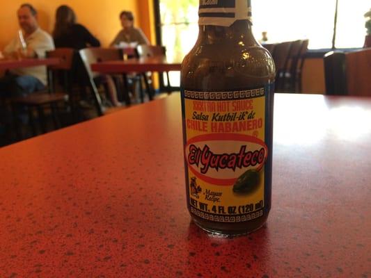 Try this excellent hot sauce, for sale in the market, adjacent to the dining room.