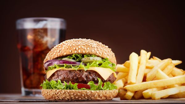 Burger and Fires with Cola in the Background. The new and improved location at Harrah's Hoosier Park has a new restaurant, Da...