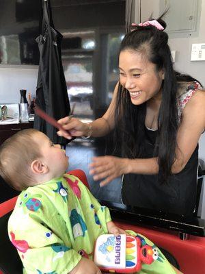 Yao and Thomas, his first haircut!