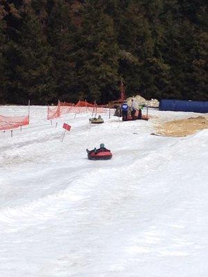 Notice how you don't have to hike back up to the top pulling your tube... you sit on your tube and get pulled back up!