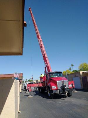 Richard from heat Slayer hvac is installing brand new air conditioner on our condo roof. Great job!