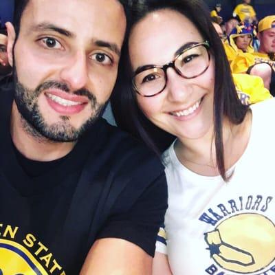 Dr Huang and her fiancé at a Warriors game. Sporting her stylish Calvin Klein glasses.