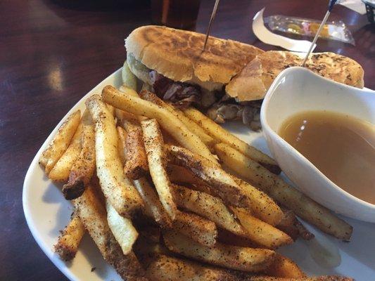 Cuban sandwich, with Cajun fries and mojo sauce.