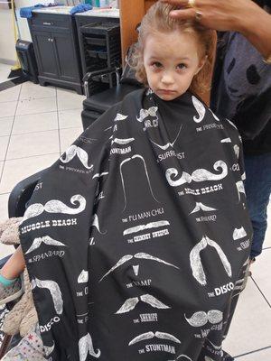 My daughter getting her first hair cut