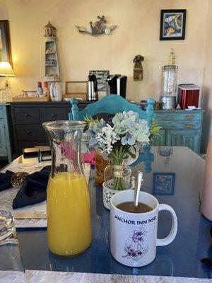 Coffee and orange juice served with breakfast