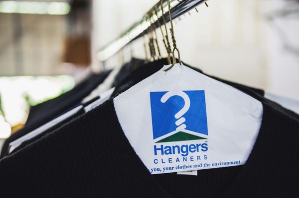 Freshly pressed garments by Hangers Cleaners