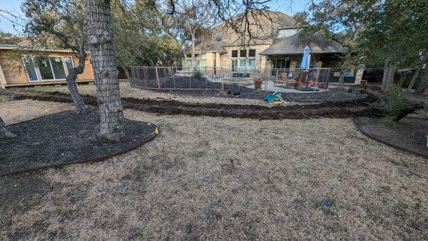 Completed trench with no busted pool pipes or landscape wires