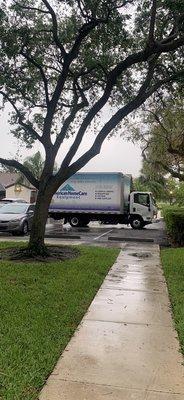 Blocked assigned parking in the rain since it must've been too inconvenient to park where he was supposed to. Gone over 10 minutes