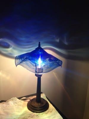 Hand crafted glass lamp (which makes an ocean scene on the wall).