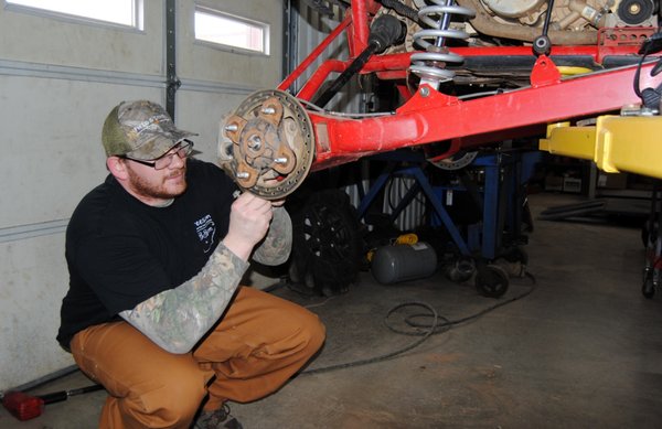 Chris is getting a Rzr fixed up for a weekend ride in the Great Outdoors.