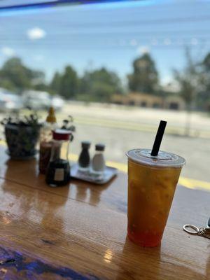 Peachy passion fruit tea with jelly and boba