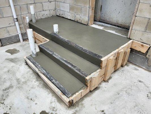 Commercial concrete stairs with steel treads