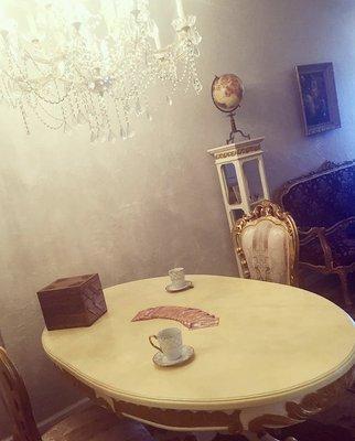 Tea and Tarot in a Victorian setting.