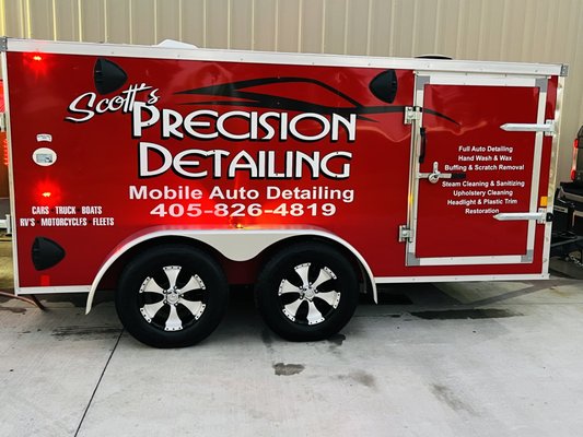 My Detailing trailer with hot water, electricity, and everything I would need at your location.