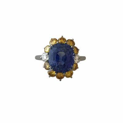 Natural sapphire and vivid diamond ring