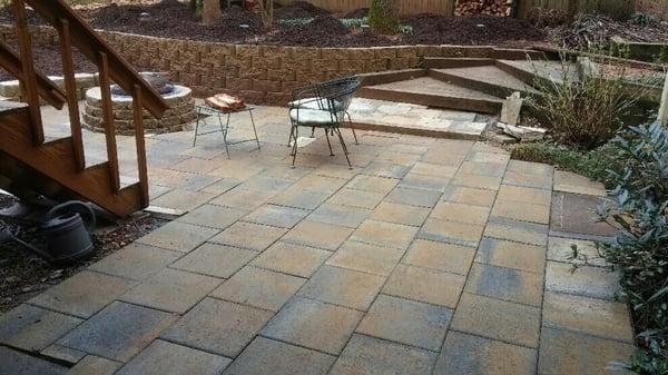 Stone patio with fire ring