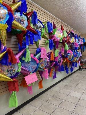 Lots of piñatas. Many sizes and characters.