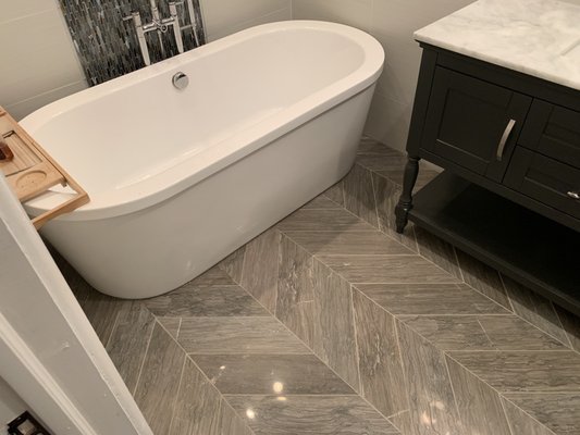 Bathroom tile, tub, and vanity