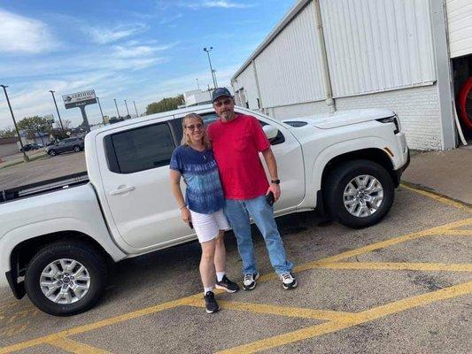 2 happy customers with our new truck.