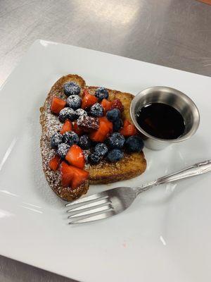 Mixed berry French toast made with house made buttery brioche