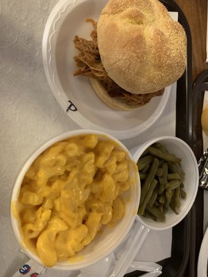 Pulled pork BBQ sandwich, Mac and cheese and green beans.