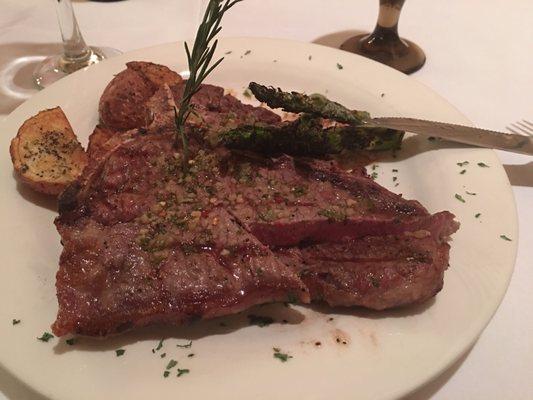 16 oz T-bone medium rare with asparagus and roasted red potatoes. Awesome!