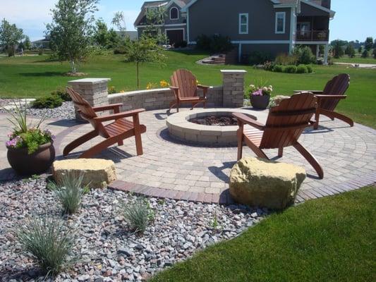 From the home owners vision the the landscape architect who got it on paper, this firepit has plenty of seating