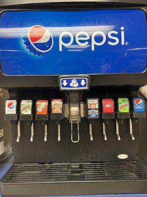 You get your own pop and tell them what you got at checkout. They have both Pepsi, and Coke