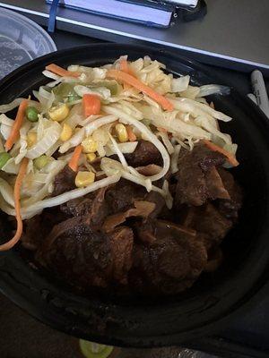 Oxtails w veggies (rice and peas underneath).