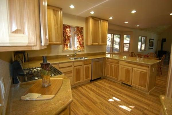 New kitchen with hickory cabinets and granite countertops