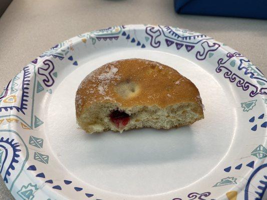 Barely filled jelly donut