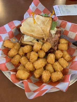 Club sandwich with tater tots.