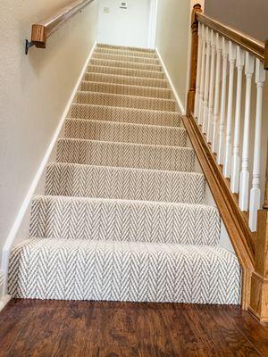 Pattern carpet installed on stairs.