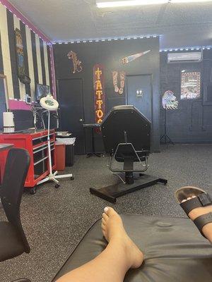 In the tattoo chair